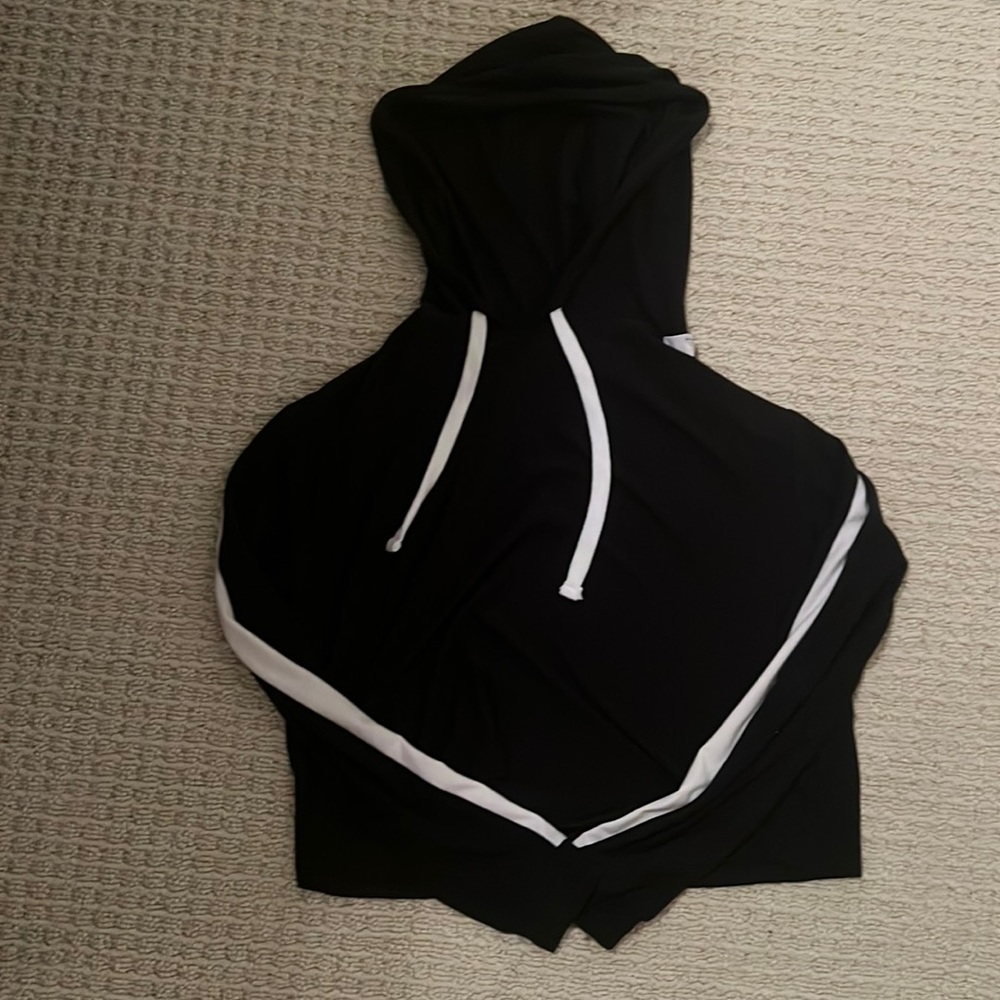 Thin sweatshirt a little bit cropped but not much